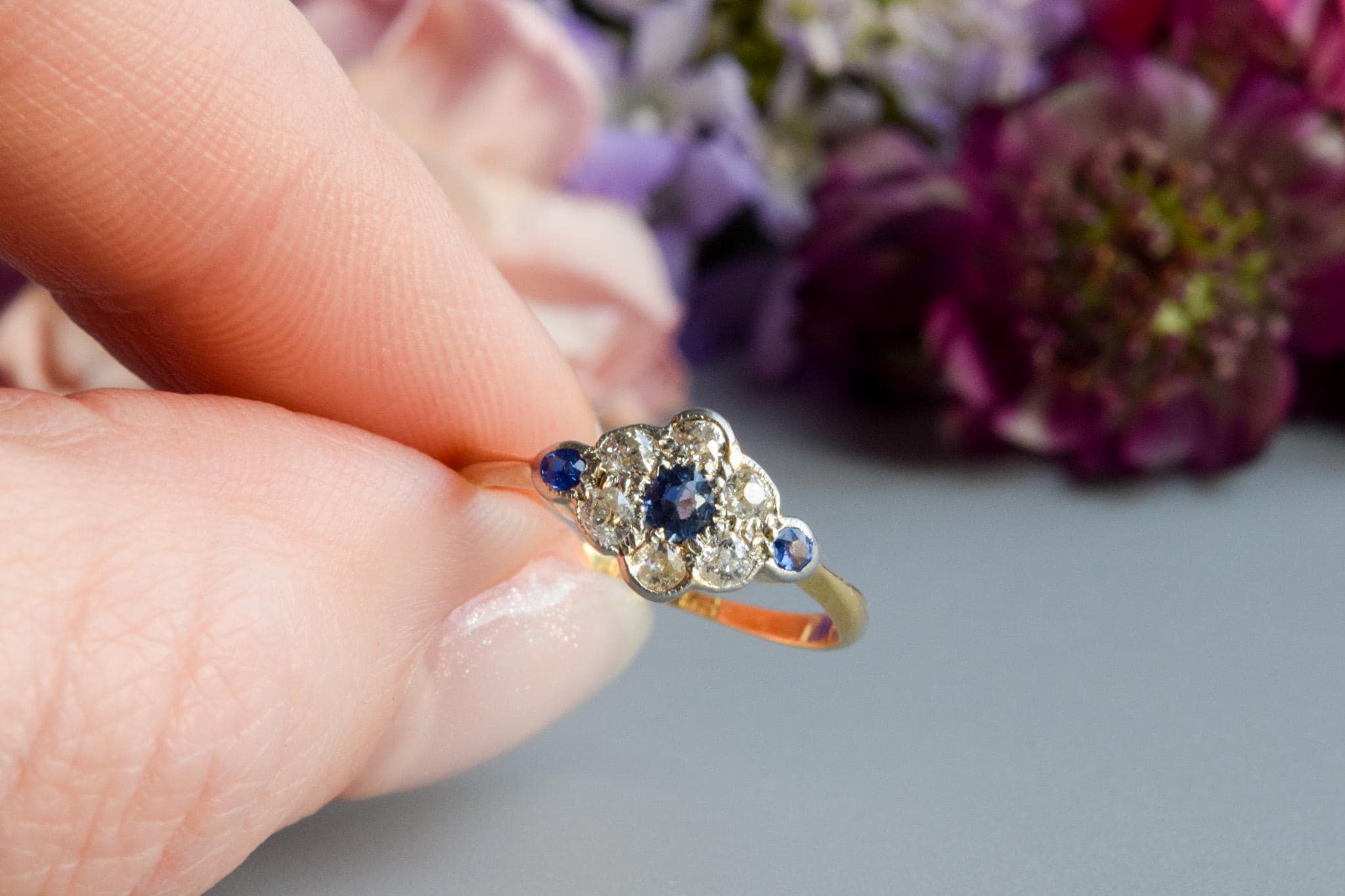 Antique Edwardian Sapphire diamond daisy ring 18 carat gold