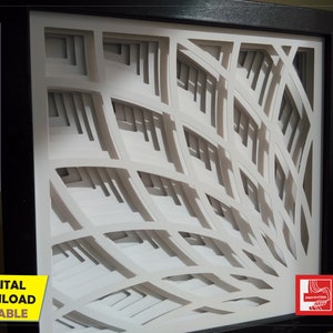 Puede incluir: Una obra de arte en papel enmarcada, con un dise&ntilde;o geom&eacute;trico en capas. La obra de arte utiliza papel blanco cortado para crear un efecto tridimensional. El marco negro rodea la pieza, que incluye texto que indica opciones de descarga digital.