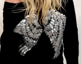 Silver wings on black slouchy cotton  sweater