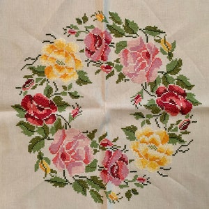 White Tablecloth with Red, Pink, and Yellow Roses