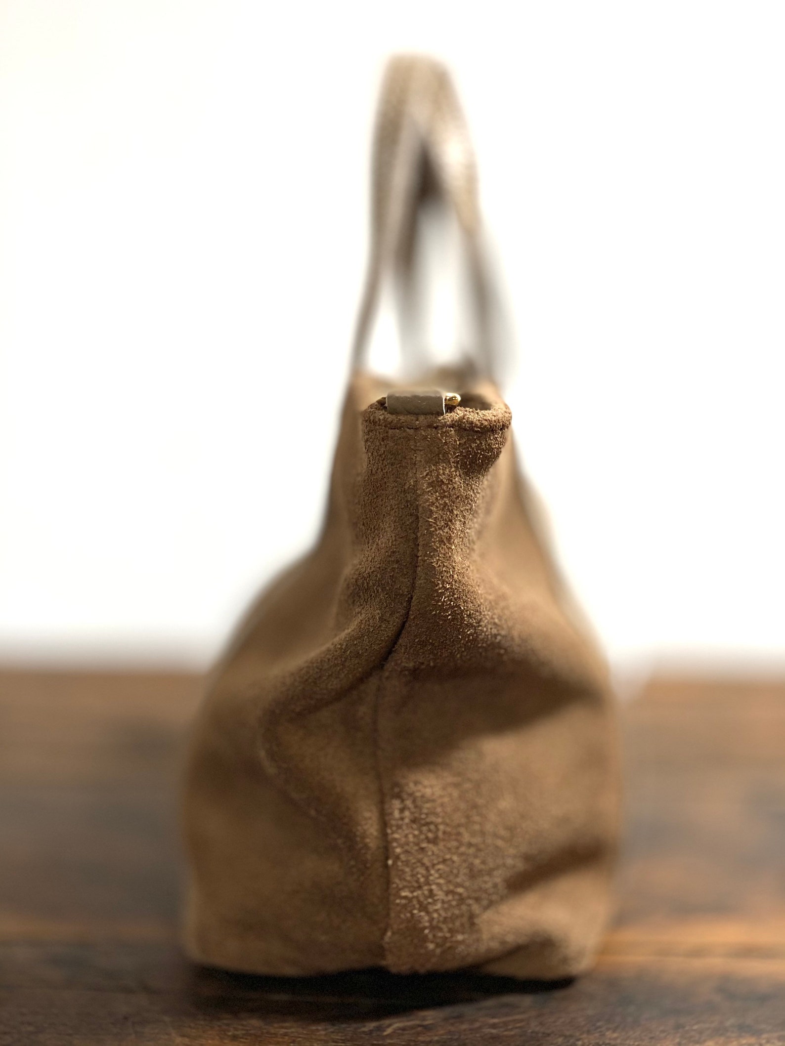 small suede handbag