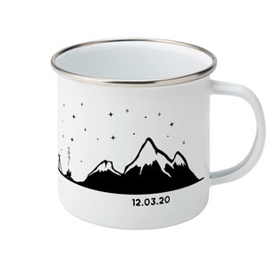 May include: White enamel mug with a black silhouette of mountains and stars, and the date 12.03.20 printed on the bottom.