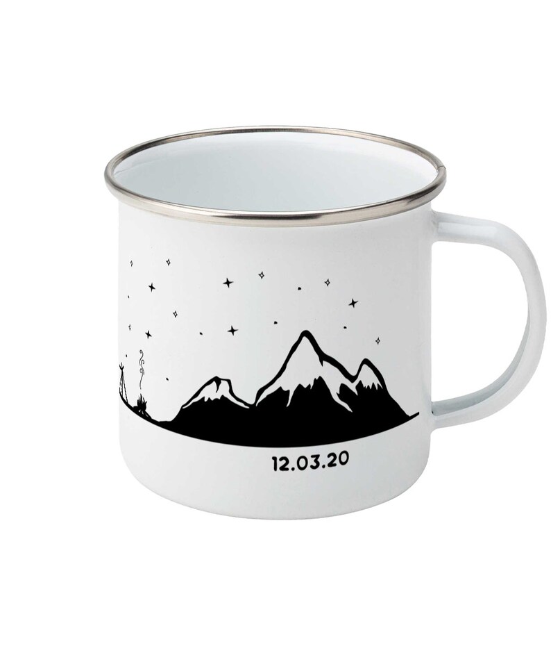 May include: White enamel mug with a black silhouette of mountains and stars, and the date 12.03.20 printed on the bottom.
