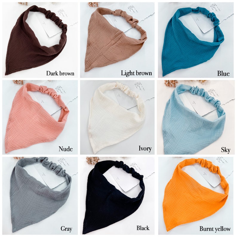 May include: Nine different colors of triangle-shaped headbands with elastic bands. The colors are dark brown, light brown, blue, nude, ivory, sky, gray, black, and burnt yellow.