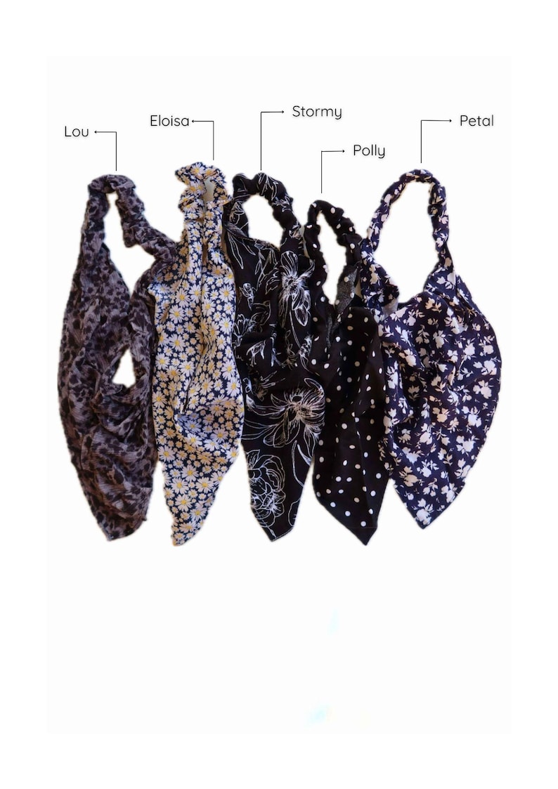 May include: Five different patterned headbands in black, white, and gray. The headbands are made of fabric and have a knotted design. The headbands are labeled "Lou", "Eloisa", "Stormy", "Polly", and "Petal".