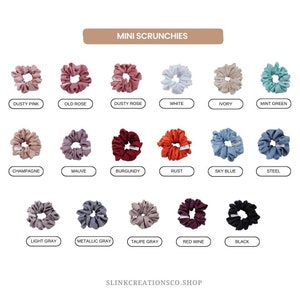 May include: A collection of 15 mini scrunchies in various colors, including dusty pink, old rose, dusty rose, white, ivory, mint green, champagne, mauve, burgundy, rust, sky blue, steel, light gray, metallic gray, taupe gray, red wine, and black. The scrunchies are arranged in three rows of five. The text "MINI SCRUNCHIES" is at the top of the image. The text "SLINKCREATIONSCO.SHOP" is at the bottom of the image.
