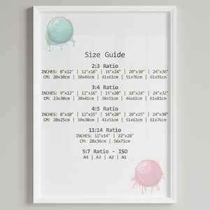 May include: A white framed chart with a size guide for different print sizes. The chart lists the dimensions in inches and centimeters for 2:3, 3:4, 4:5, 11:14, and 5:7 ratios. The chart also includes ISO paper sizes A4, A3, A2, and A1.