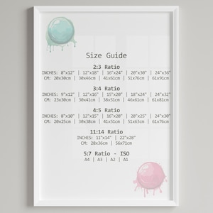 May include: A white framed chart with a size guide for different print sizes. The chart lists the dimensions in inches and centimeters for 2:3, 3:4, 4:5, 11:14, and 5:7 ratios. The chart also includes ISO sizes A4, A3, A2, and A1.