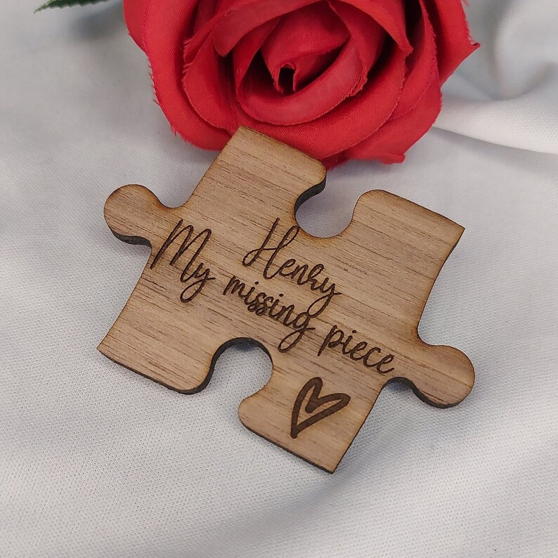 May include: Wooden puzzle piece with the text "My Henry missing piece" and a small heart carved into the wood.