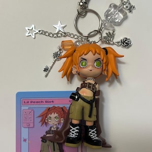 Porte-clés Peach Riot Loading - Gigi Thief