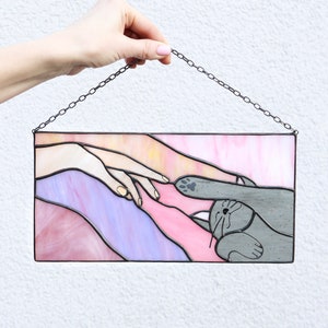 Suncatcher Cat reaching for a human hand with its paw Stained glass window panel Hanging home decor Glass wall art Gift for cat lovers