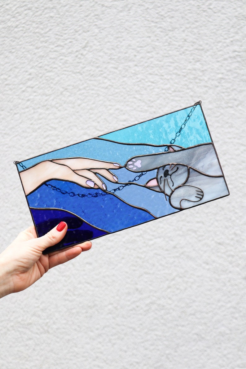 Suncatcher Cat reaching for a human hand with its paw Stained glass window panel Hanging home decor Glass wall art Gift for cat lovers Blue and turquoise