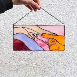 Suncatcher Cat reaching for a human hand with its paw Stained glass window panel Hanging home decor Glass wall art Gift for cat lovers Orange cat