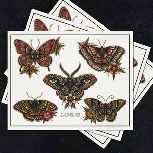 May include: Five colorful butterfly tattoo flash designs on a white background. The butterflies are in various poses and feature intricate details. The designs include a red and green butterfly, a black and green butterfly, a green and yellow butterfly, and two red and black butterflies. The text "RICK MEJIA 2021 LUCKY LUCY TATTOO PRINTS" is at the bottom of the page.