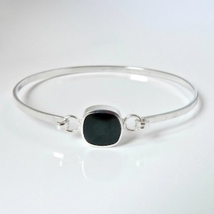 Whitby jet tension bangle rounded square design