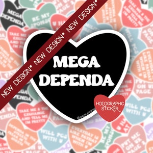 May include: A black heart-shaped sticker with white text that reads "MEGA DEPENDA". The sticker is surrounded by a variety of colorful heart-shaped stickers with different text on them. The sticker is labeled "Holographic Sticker".