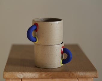 Handmade Stoneware Mug – Beige Ceramic Cup with Colorful Handle