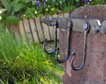 Hand crafted metal wall hooks made by a blacksmith