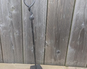 Leafy style fire poker with an individual stand