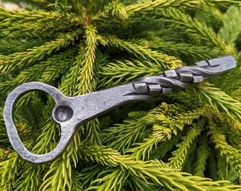 Hand forged bottle opener made in scotland