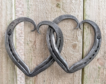 Handmade linked horseshoe hearts(stamped with name initials and anniversary dates)