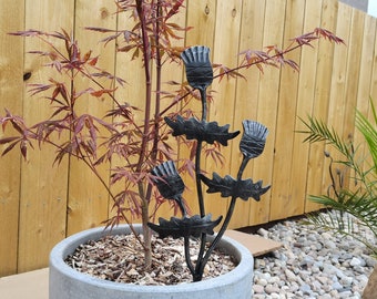Three thistle garden sculpture hand forged by a Scottish blacksmith