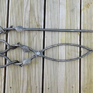 Leafy style fire poker and fire tong set. Handmade in Scotland