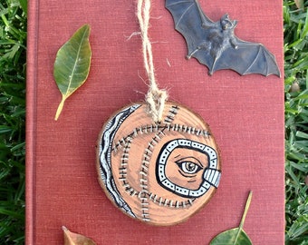 3x3.5 in. eye spell book halloween tree ornament hand painted wood slice circle - hocus pocus mini wall hanging decor - spooky cute art gift