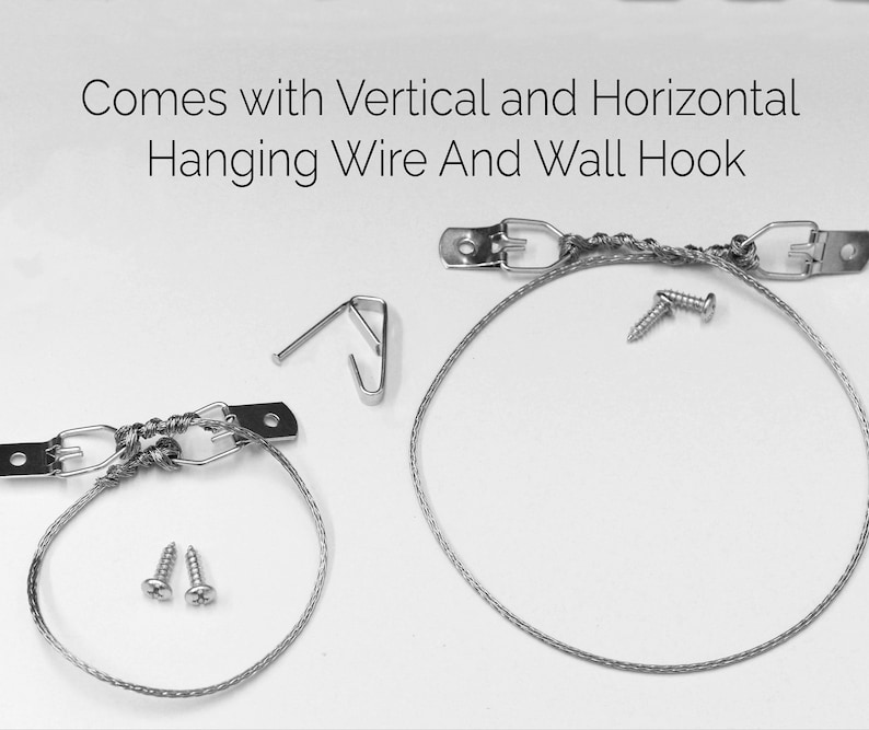 May include: A close-up of picture hanging hardware, including metal brackets, hanging wire, screws, and a wall hook. The text "Comes with Vertical and Horizontal Hanging Wire And Wall Hook" is at the top of the image.