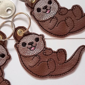 JiangZShangM 2er-Set Otter Schlüsselanhänger – Cartoon-Design Für Paare Und Freunde, Robustes Metall, Als Geschenk Für Tasche, Auto Oder Schlüssel, Symbolisiert Zusammenhalt