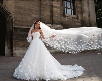 Tulle wedding dress decorated with butterflies. White wedding dress. A line bridal gown. Custom made wedding dress.