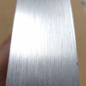 Aluminum Brushed 1MM PVC edgebanding 15/16" x 120" with PSA peel stick adhesive