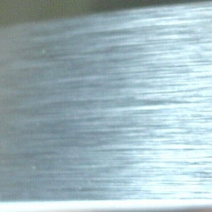 Aluminum Brushed Metal 1MM PVC edgebanding 2" x 120" with preglued adhesive