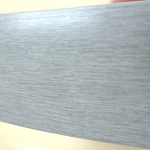Brushed Aluminum PVC edgebanding 15/16&quot; x 120&quot; with no adhesive (simulated)