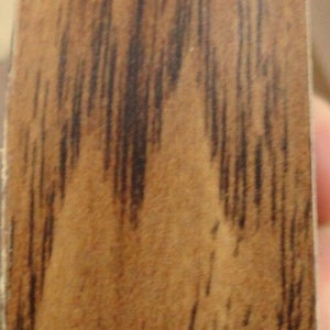 Oak Walnut polyester edgebanding in 1-5/16&quot; x 120&quot; with glue adhesive (1.3125&quot;)