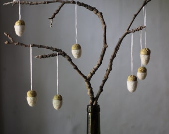 White felted acorns with golden caps for Christmas decor