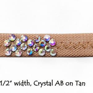 May include: Tan ribbon trim with a row of iridescent crystal AB rhinestones, 1/2 inch wide.