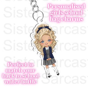May include: A personalised school bag charm with a cartoon illustration of a girl in a school uniform. The charm has a silver chain and the text reads "Personalised girls school bag charms" and "Perfect to match your back to school water bottle."