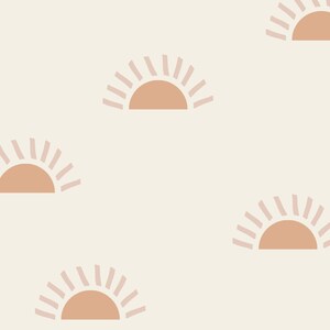 May include: A seamless pattern featuring a repeating design of stylized suns with pink rays and peach-colored centers on a light beige background.