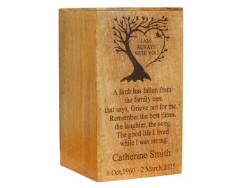 May include: A wooden memorial box with engraved text and a tree design. The text includes the phrase "I am always with you" and a personalized message, along with the name Catherine Smith and dates 8 Oct, 1960 - 2 March, 2025.
