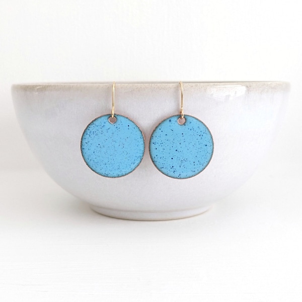 Light Blue Enamelled Circle Dangly Earrings on Gold Plated ear wires. Blue speckled round earrings. kiln fired and handmade in the UK.