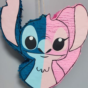 Pinata Stitch fait main neuf avec du carton et decorer avec papiers crépons ouverture au dos pour garniture amuse petits et grands animera votre fête joie et rire
