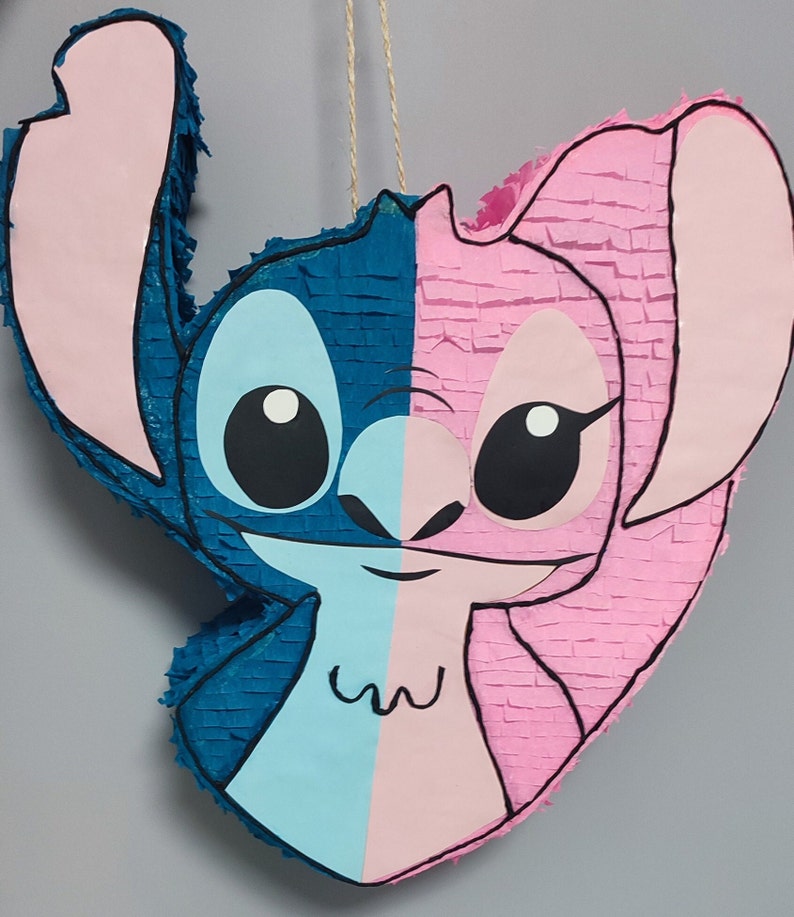 Pinata Stitch fait main neuf avec du carton et decorer avec papiers crépons ouverture au dos pour garniture amuse petits et grands animera votre fête joie et rire