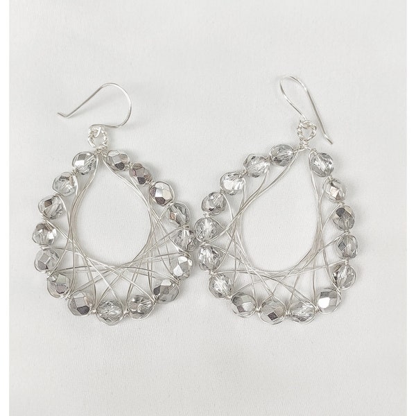 Teardrop silver earrings with cristals
