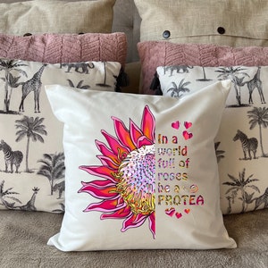 Plush White Protea cushion “In a world full of Roses be a Protea” deluxe 'soft feel' scatter cushion. ( 40x40cm )Hot pink protea.