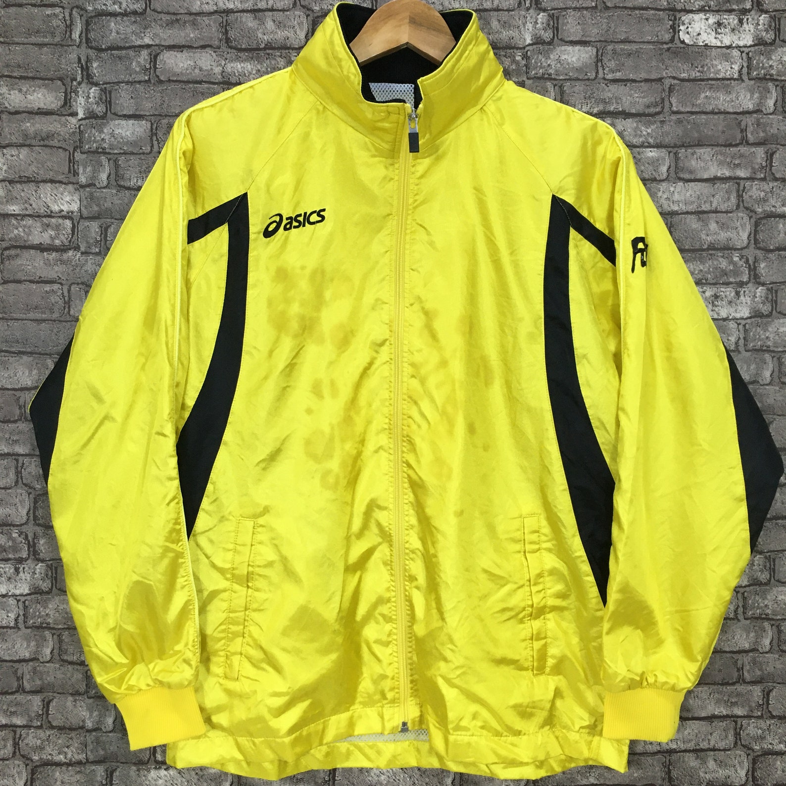 asics accelerate jacket yellow