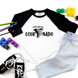 May include: White and black baseball tee shirt with a black tornado graphic and the text "category four NADO".