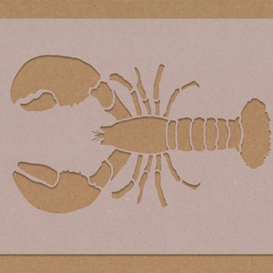 May include: A white stencil of a lobster with a detailed design. The stencil is on a brown background.