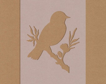 Stencil uccello sul ramo