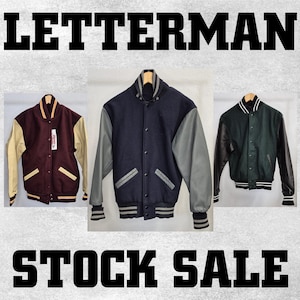 May include: Three letterman jackets in different colors are displayed against a textured background. The jackets include a maroon and cream, a navy and gray, and a green and black jacket. The text "LETTERMAN STOCK SALE" is displayed in bold, black letters.